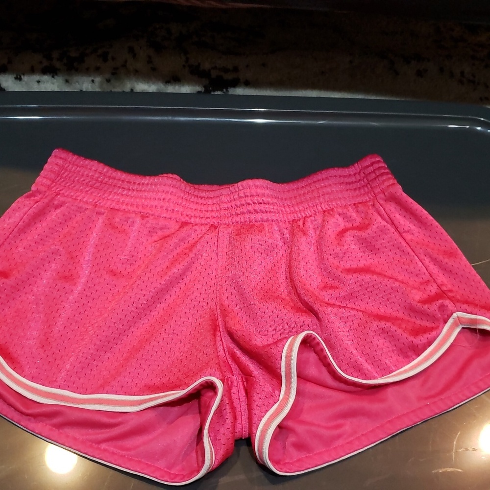 Pink running shorts